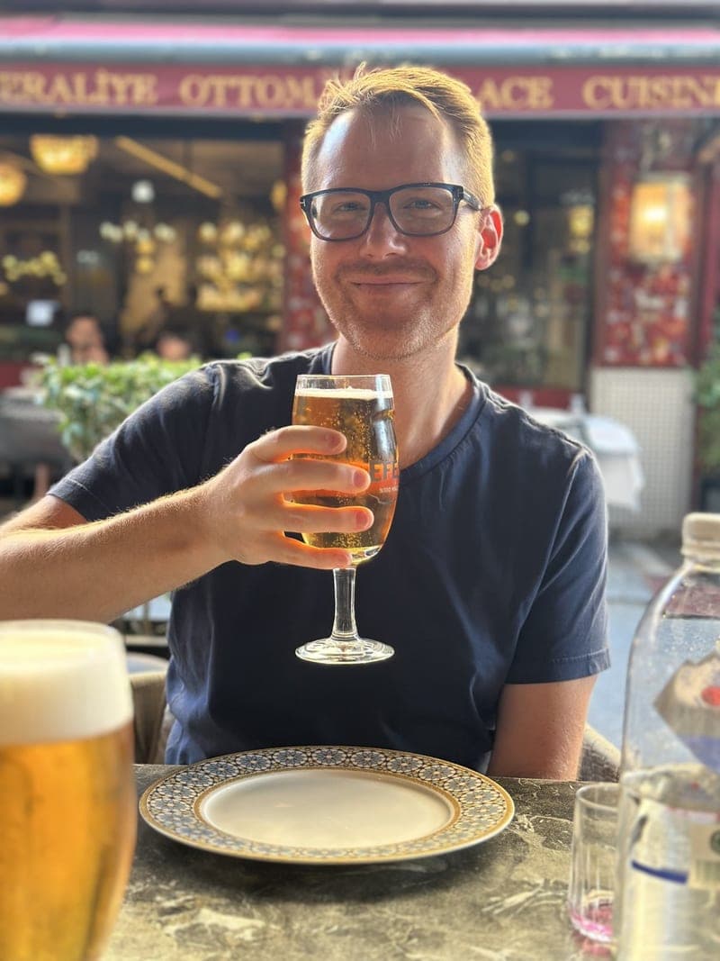 Sam raising a glass